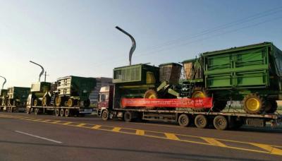 Uni-Home with International Trucking of Cotton Pickers
